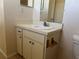 A bathroom vanity with a white sink at 11090 Mcfadden Ave, Englewood, FL 34224