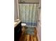 Bathroom featuring a shower with a patterned curtain and granite sink at 13244 Doral Ave, Port Charlotte, FL 33953