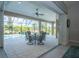 Enclosed lanai with outdoor dining set near pool at 13252 Keystone Blvd, Port Charlotte, FL 33981