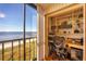 Bright home office with scenic water view, integrated shelving, and dedicated workspace at 14459 River Beach Dr # 122, Port Charlotte, FL 33953
