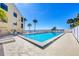 Refreshing community pool with lounge chairs, perfect for relaxing and enjoying the outdoors at 14459 River Beach Dr # 122, Port Charlotte, FL 33953