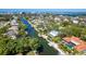 Birds-eye view of a waterfront neighborhood with a tranquil canal at 1648 Shelburne Ln, Sarasota, FL 34231
