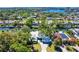 Aerial view of a waterfront home with lush landscaping at 1648 Shelburne Ln, Sarasota, FL 34231