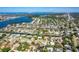 Expansive aerial view of a residential neighborhood with canal-front homes and waterfront access at 1648 Shelburne Ln, Sarasota, FL 34231