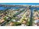 This aerial view shows a waterfront neighborhood with direct access to the ocean at 1648 Shelburne Ln, Sarasota, FL 34231