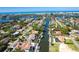 Aerial view showcasing a waterfront neighborhood in a coastal city at 1648 Shelburne Ln, Sarasota, FL 34231