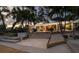 Beautiful backyard with a patio, dock, and scenic waterfront views, enhancing the home's appeal at 1648 Shelburne Ln, Sarasota, FL 34231