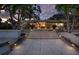 Inviting outdoor space featuring a patio and lush landscaping with tropical plants at 1648 Shelburne Ln, Sarasota, FL 34231