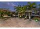 Scenic patio with swing chairs and comfortable seating, ideal for enjoying waterfront views at 1648 Shelburne Ln, Sarasota, FL 34231