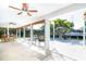 The bright sun room has views of the pool and dock at 1648 Shelburne Ln, Sarasota, FL 34231