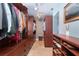 A very large walk-in closet with custom storage solutions at 1648 Shelburne Ln, Sarasota, FL 34231