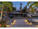 Picturesque waterfront view featuring a private dock and several boats at 1648 Shelburne Ln, Sarasota, FL 34231