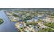 Expansive aerial shot of canal-front community with lush green landscapes and tranquil waterways at 18610 Ayrshire, Port Charlotte, FL 33981
