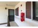 The front entrance features neutral decor and an adjacent fire extinguisher at 19505 Quesada Ave # B202, Port Charlotte, FL 33948