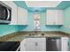 Updated kitchen with granite counters, stainless steel appliances at 19505 Quesada Ave # B202, Port Charlotte, FL 33948