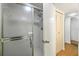 Shower with glass doors and white tile at 19505 Quesada Ave # B202, Port Charlotte, FL 33948