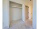 Spacious walk-in closet with shelving at 202 South Dr, Englewood, FL 34223