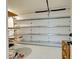 Spacious garage with ample room for storage and a workbench at 202 South Dr, Englewood, FL 34223