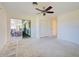 Interior view of a room with sliding door and view of outdoor seating at 202 South Dr, Englewood, FL 34223