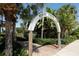 Entrance to Venice Fishing Pier featuring lush greenery and a welcoming archway for anglers and visitors at 220 Southampton Drive # 325, Venice, FL 34293