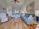 Spacious living room connects dining area, offering an open and airy feel at 220 Southampton Drive # 325, Venice, FL 34293