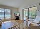 Bright living room with a view and sliding glass doors to the lanai at 220 Southampton Drive # 325, Venice, FL 34293