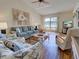 Cozy living room featuring hardwood floors and comfortable furniture at 220 Southampton Drive # 325, Venice, FL 34293