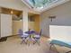 Private outdoor patio with seating and serene ambiance at 220 Southampton Drive # 325, Venice, FL 34293