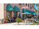 Outdoor cafe seating and shopping venues, creating a lively atmosphere for community members at 220 Southampton Drive # 325, Venice, FL 34293