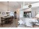 Open dining room with dark wood table and seating for four at 24135 Buckingham Way, Punta Gorda, FL 33980