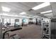 Well-equipped gym featuring a variety of exercise machines and free weights for a comprehensive workout at 24135 Buckingham Way, Punta Gorda, FL 33980