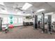 Bright gym area with fitness equipment, including weight machines and exercise balls, promoting a healthy lifestyle at 24135 Buckingham Way, Punta Gorda, FL 33980