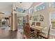Comfortable dining room featuring decorative windows, modern decor and backyard views at 2418 Herron Ter, Port Charlotte, FL 33981