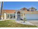 Charming single-Gathering home with well-manicured lawn and unique architectural details at 2418 Herron Ter, Port Charlotte, FL 33981