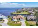 A beautiful single-Gathering home with a lush green lawn and access to water and boating at 2418 Herron Ter, Port Charlotte, FL 33981