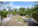 View of backyard space with open area and mature landscaping at 2760 Lemon Ave, Englewood, FL 34223