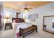 Charming bedroom with wood ceiling, plush bedding, and decorative accents for a warm ambiance at 2760 Lemon Ave, Englewood, FL 34223