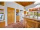 Functional kitchen with a center island, modern appliances, and terracotta tile flooring at 2760 Lemon Ave, Englewood, FL 34223