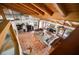 Spacious living room with vaulted wood ceilings, tile floors, and double french doors to outdoor space at 2760 Lemon Ave, Englewood, FL 34223