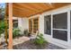 Outdoor patio with covered area, ideal for relaxing and enjoying the peaceful surroundings at 2760 Lemon Ave, Englewood, FL 34223