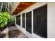 Screened lanai with access to the home and an outdoor area at 2760 Lemon Ave, Englewood, FL 34223