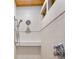 Elegant tiled shower with bench, dual showerheads, and decorative accents at 2760 Lemon Ave, Englewood, FL 34223