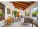 Relaxing sunroom with wood ceiling, cozy seating, and plenty of natural light at 2760 Lemon Ave, Englewood, FL 34223
