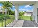 Cozy covered patio featuring brick pavers, offering a serene outdoor area for relaxation and enjoyment at 280 Antis Dr, Rotonda West, FL 33947