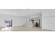 Open living space with a stylish kitchen and sliding glass doors to the backyard at 280 Antis Dr, Rotonda West, FL 33947