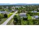 This property showcases the backyard of a new home with modern design at 280 Antis Dr, Rotonda West, FL 33947