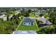 New construction home boasts a large backyard and a modern design with black roof at 280 Antis Dr, Rotonda West, FL 33947