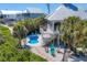 Inviting backyard with a private pool and a cozy seating area, ideal for outdoor entertaining at 310 Kettle Harbor Dr, Placida, FL 33946