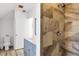 Modern bathroom featuring a large shower and a vanity with marble counter tops at 310 Kettle Harbor Dr, Placida, FL 33946