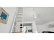 Bright bedroom featuring a bunk bed accessed by a ladder at 310 Kettle Harbor Dr, Placida, FL 33946